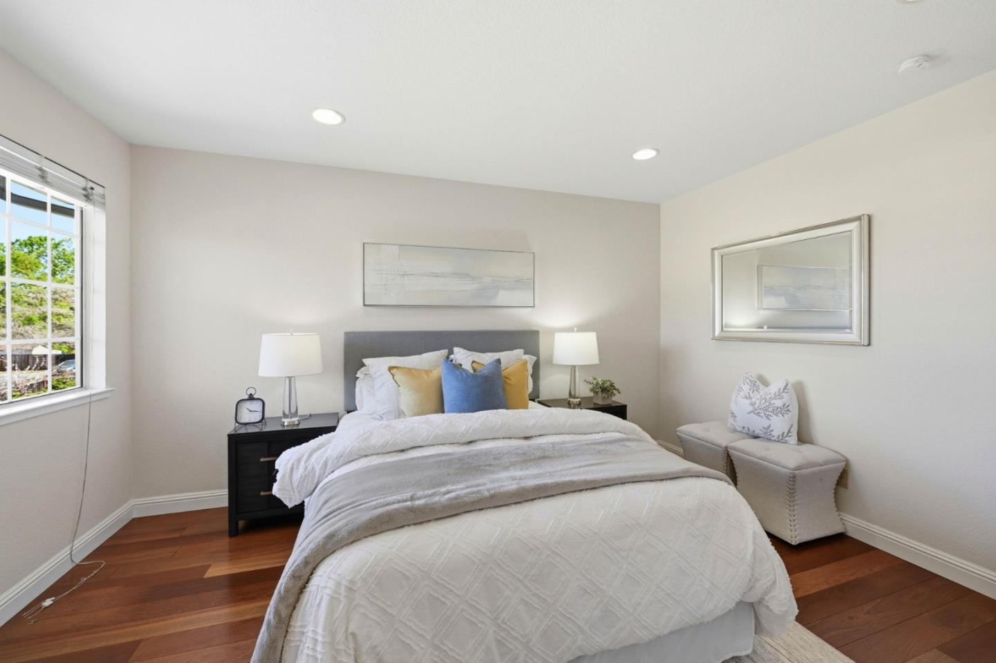 6207 McAbee Road San Jose, CA 95120 - Photo 30 of 48 a bedroom with a bed and wooden floor