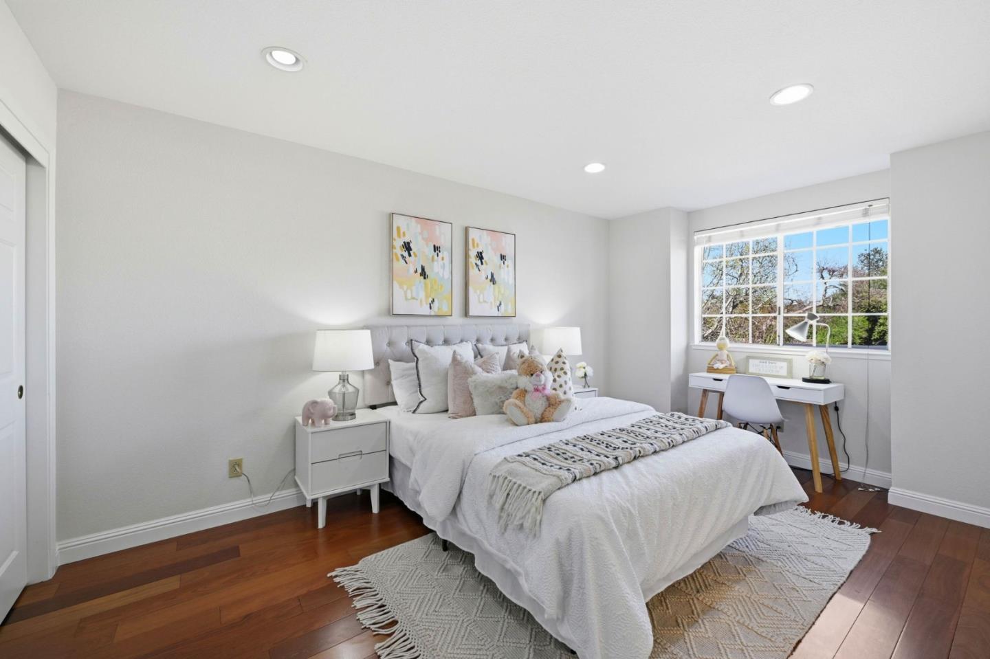 6207 McAbee Road San Jose, CA 95120 - Photo 32 of 48 a bedroom with a bed and a large window