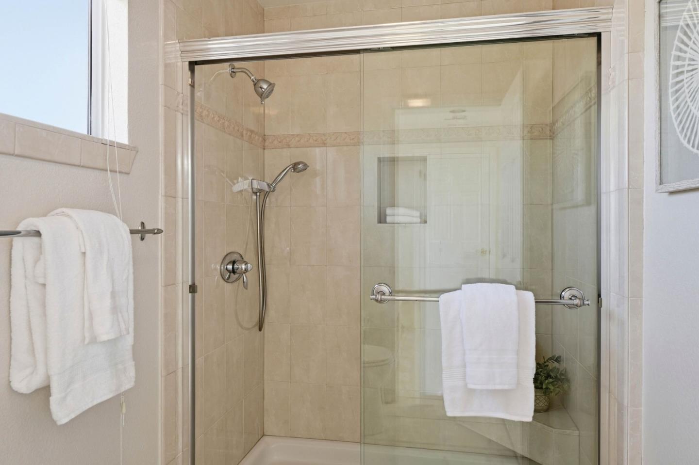 6207 McAbee Road San Jose, CA 95120 - Photo 35 of 48 a bathroom with a shower and a mirror