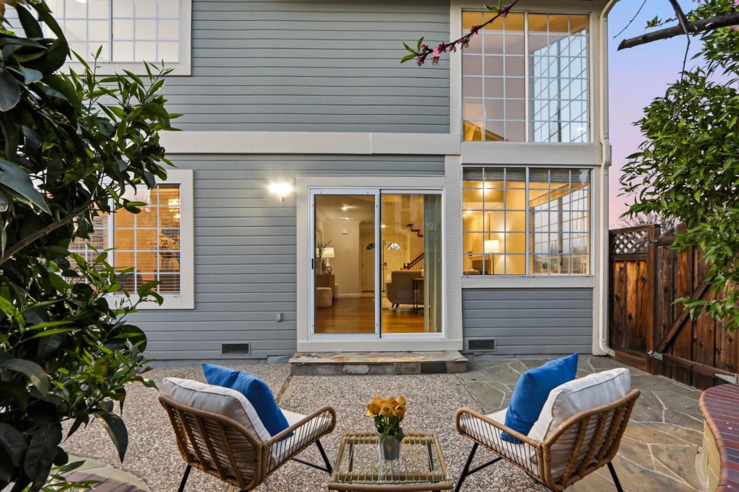 6207 McAbee Road San Jose, CA 95120 - Photo 38 of 48 a view of a house with a chairs and table in a patio