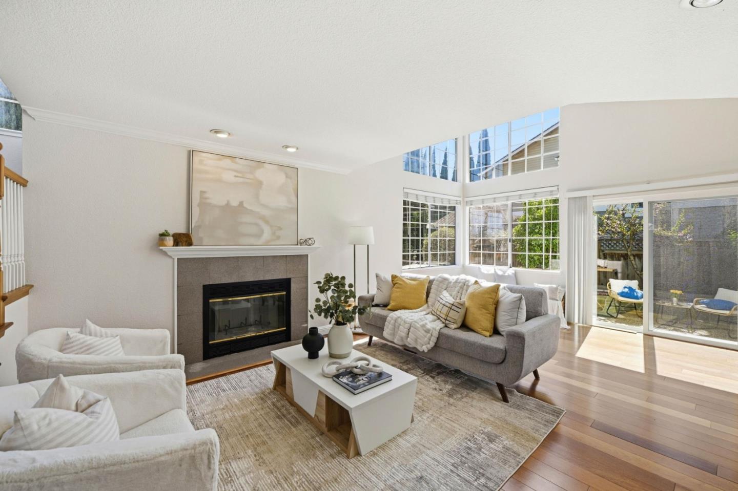 6207 McAbee Road San Jose, CA 95120 - Photo 7 of 48 a living room with furniture a rug and a fireplace