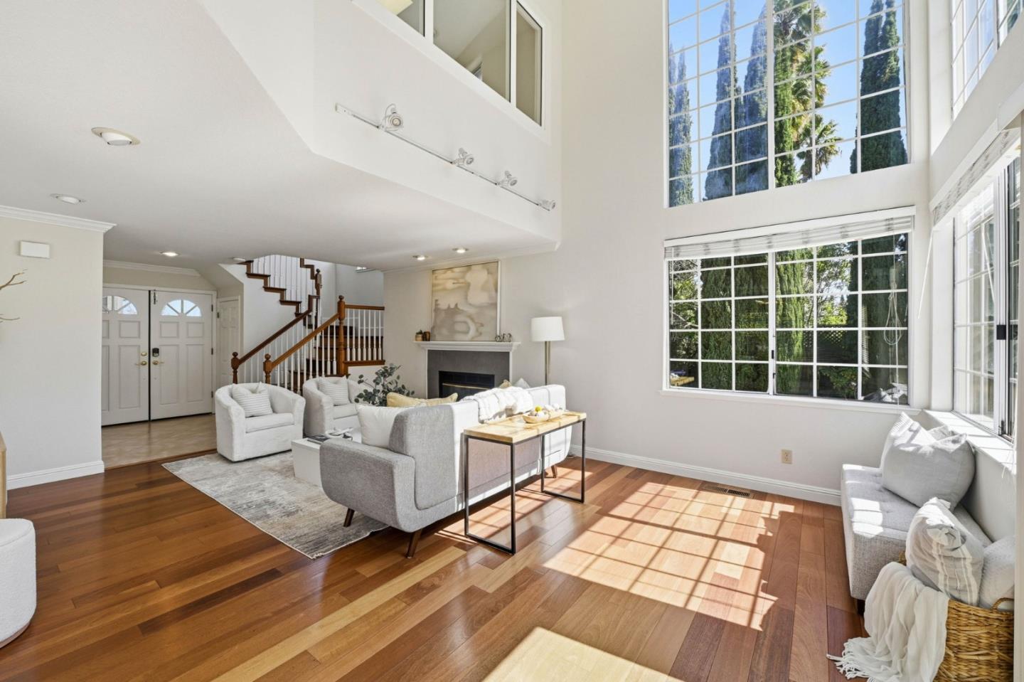 6207 McAbee Road San Jose, CA 95120 - Photo 8 of 48 a living room with furniture and a large window