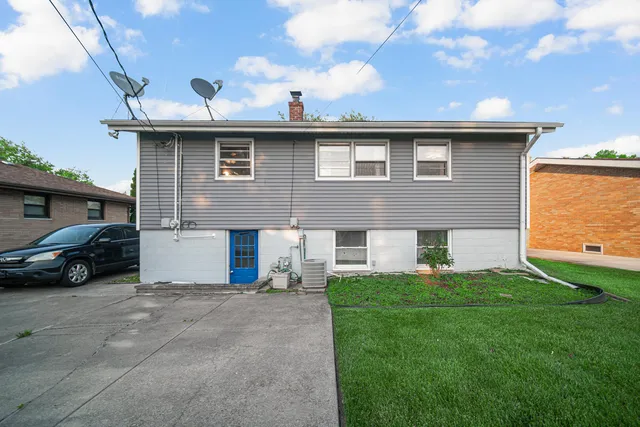 a view of a house with a patio