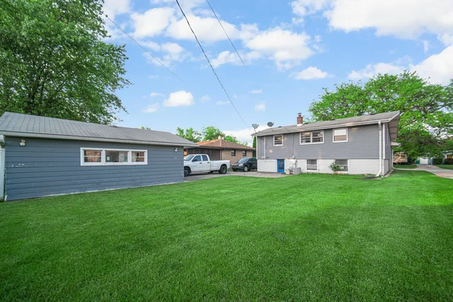 a house view with a garden space