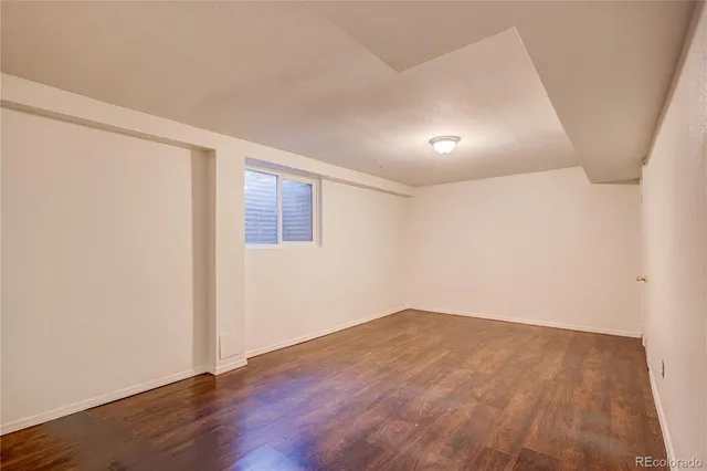 a bathroom with a sink toilet a mirror and shower