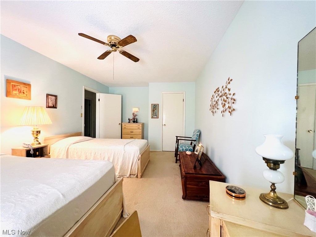 4940 Friar Road, Unit B Stow, OH 44224 - Photo 28 of 33 Carpeted bedroom featuring ceiling fan