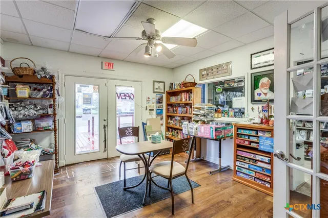 a view of a workspace with furniture