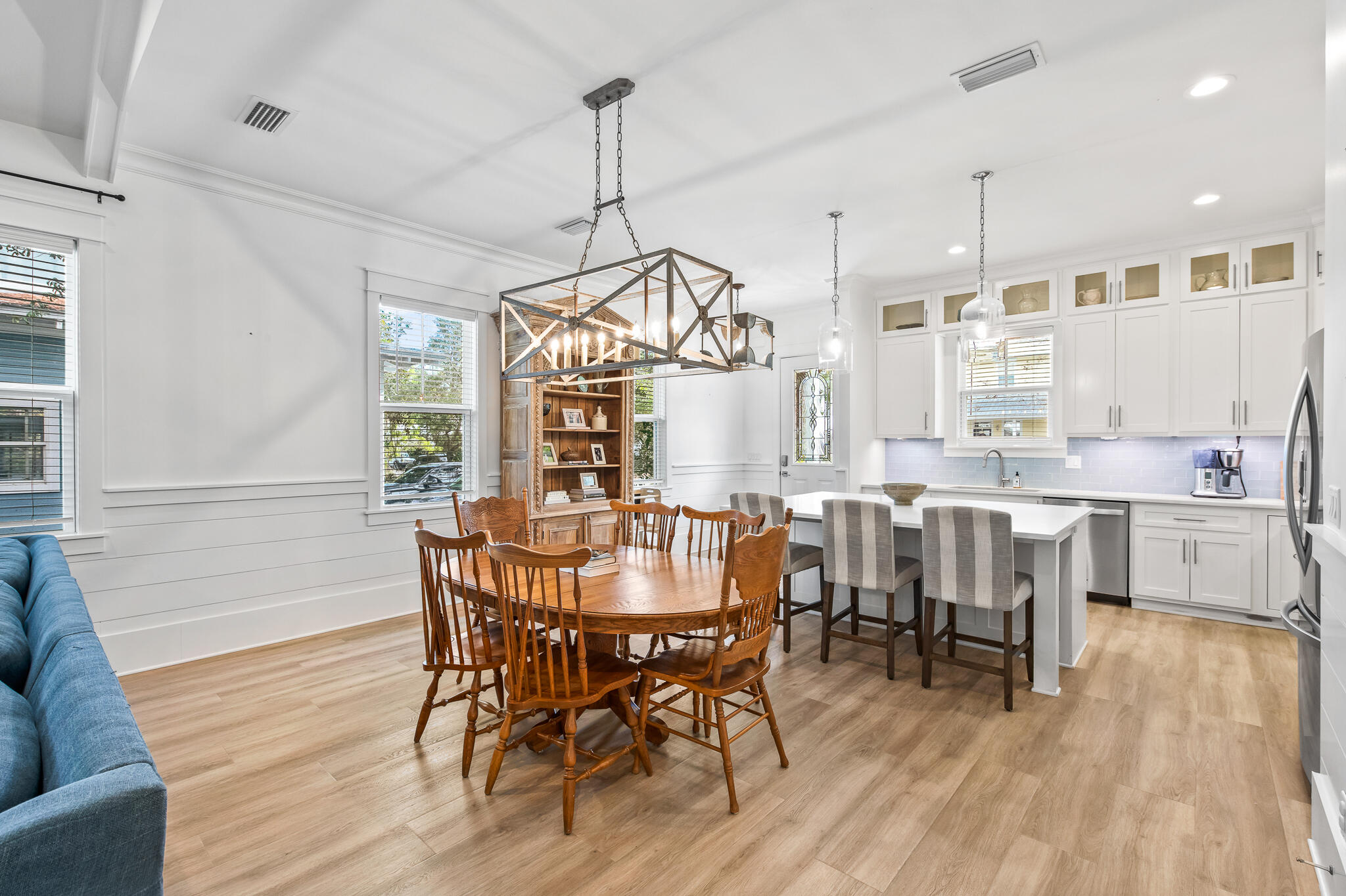 175 Greenbriar Lane Santa Rosa Beach, FL 32459 - Photo 12 of 77 a view of a dining room and livingroom with furniture wooden floor a chandelier
