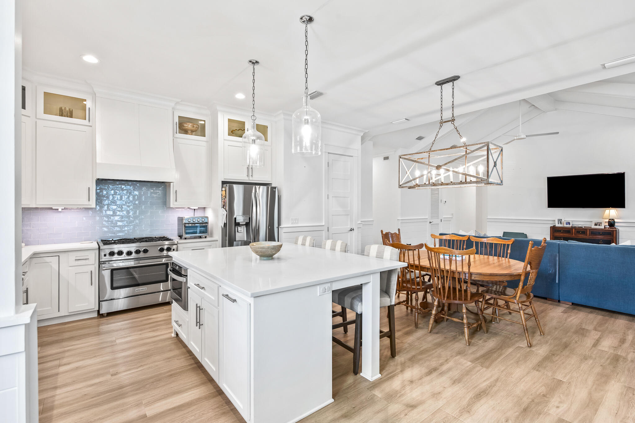 175 Greenbriar Lane Santa Rosa Beach, FL 32459 - Photo 2 of 77 a large kitchen with a table and chairs in it