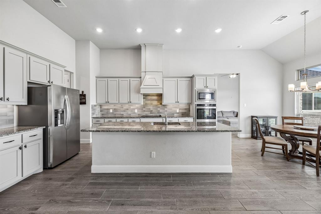 1581 Lynx Loop Forney, TX 75126 - Photo 13 of 38 Large kitchen with an oversized island