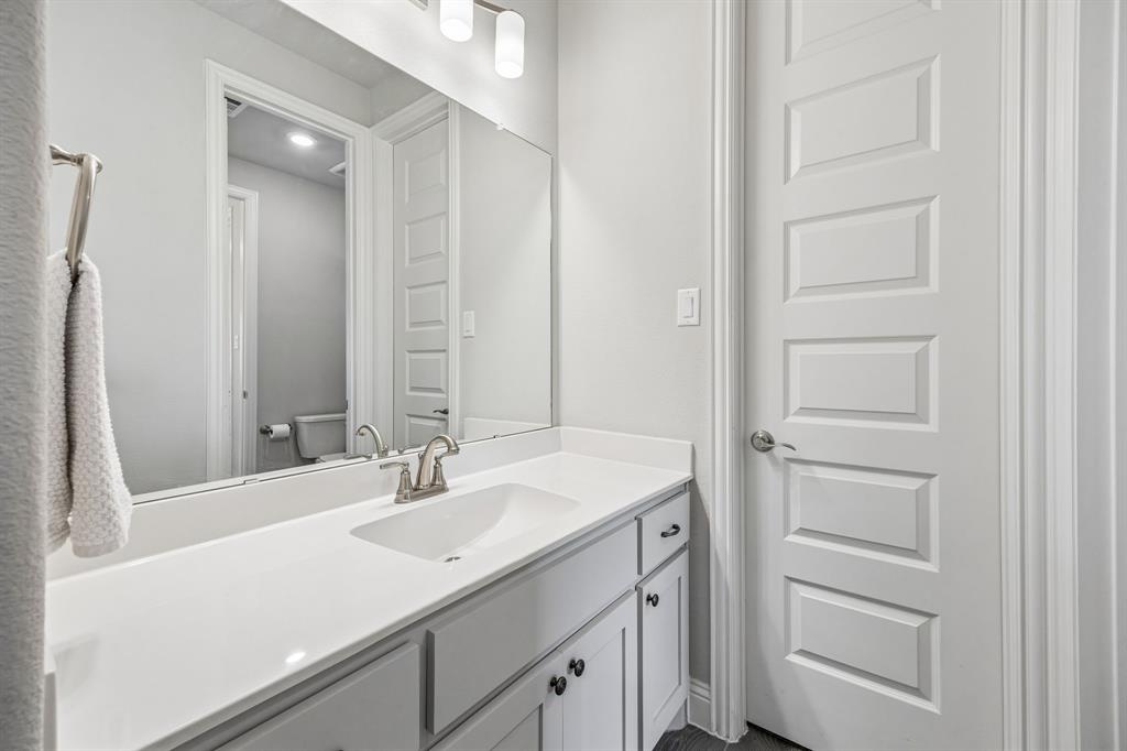 1581 Lynx Loop Forney, TX 75126 - Photo 26 of 38 Bathroom with vanity and toilet