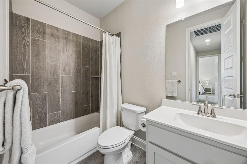 1581 Lynx Loop Forney, TX 75126 - Photo 30 of 38 Bathroom with vanity, shower / bathtub combination