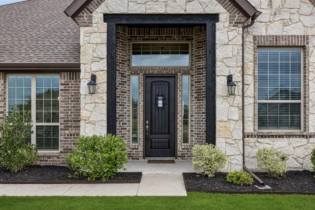 1581 Lynx Loop Forney, TX 75126 - Photo 4 of 38 Fresh landscaping at entry