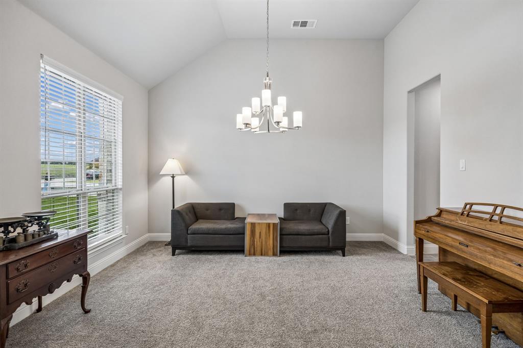 1581 Lynx Loop Forney, TX 75126 - Photo 7 of 38 Dining room to the left of the entry is currently being used as a sitting room.