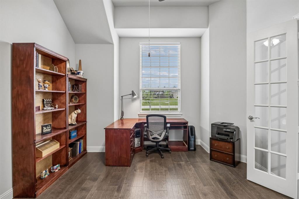 1581 Lynx Loop Forney, TX 75126 - Photo 8 of 38 Home office with a ceiling fan and great natural light.