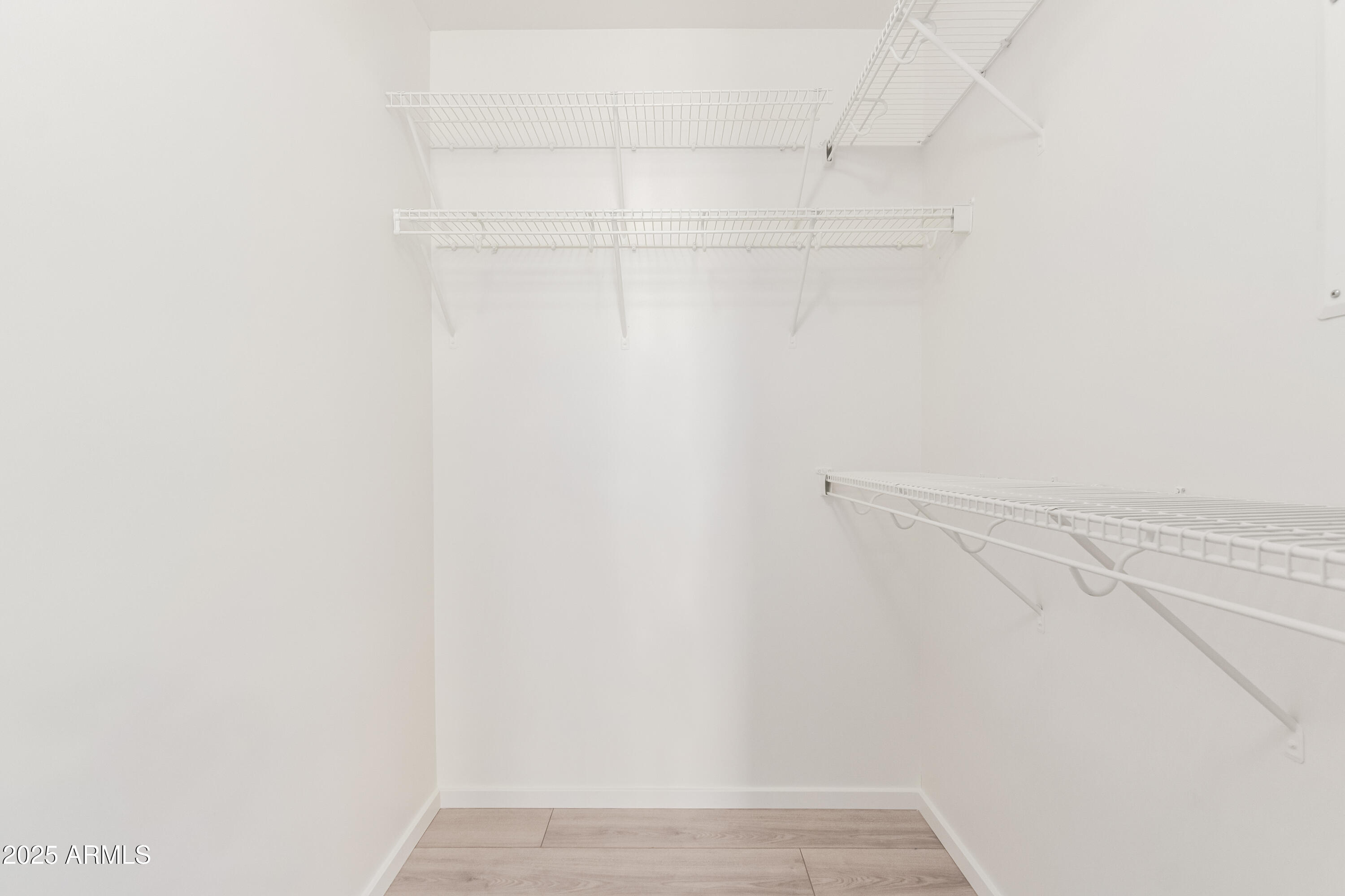 4808 North 24th Street, Unit 1005 Phoenix, AZ 85016 - Photo 15 of 34 a view of small space with racks on the wall