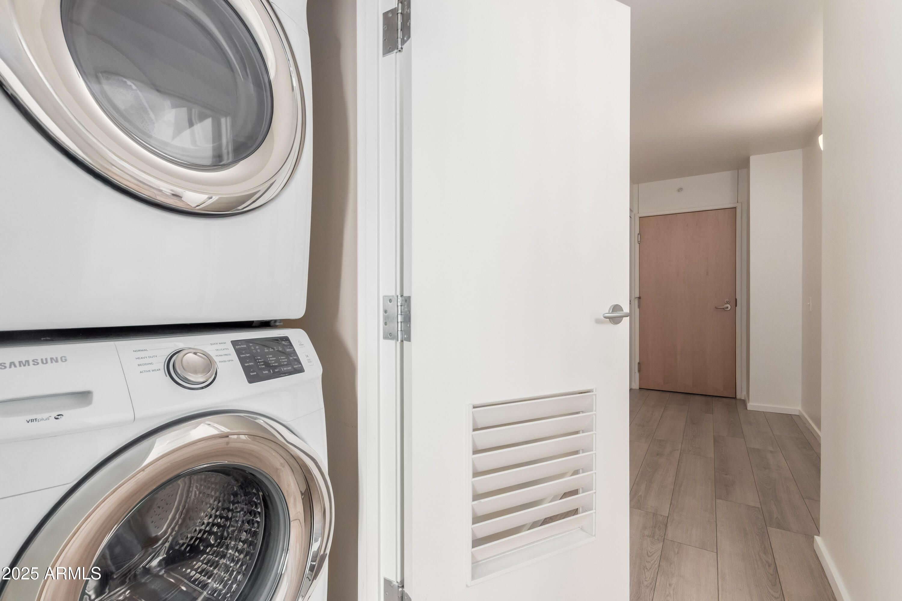 4808 North 24th Street, Unit 1005 Phoenix, AZ 85016 - Photo 20 of 34 a view of a hallway with washer and dryer