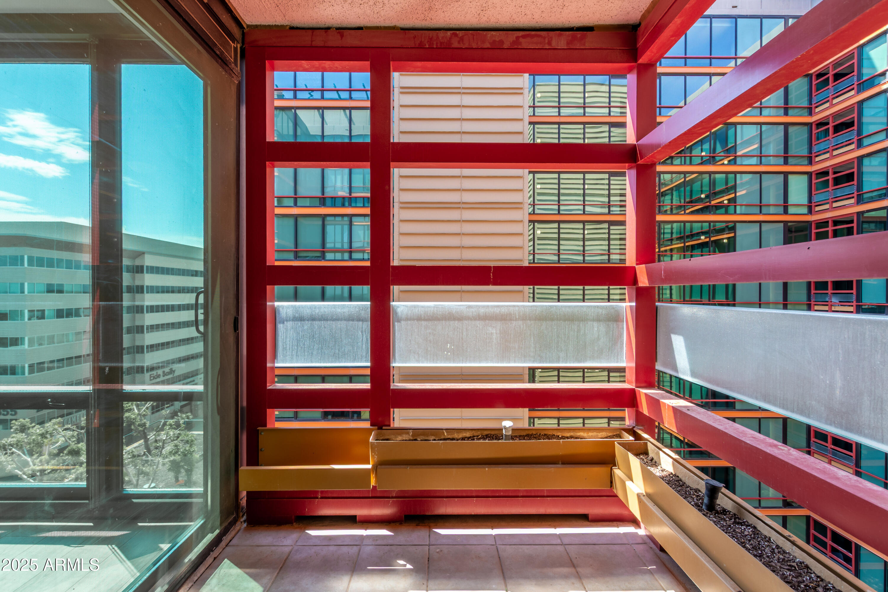 4808 North 24th Street, Unit 1005 Phoenix, AZ 85016 - Photo 21 of 34 a view of staircase with a rug and a window