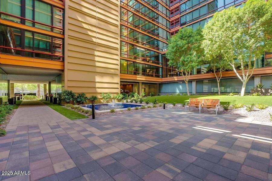 4808 North 24th Street, Unit 1005 Phoenix, AZ 85016 - Photo 29 of 34 a view of a building with sitting area