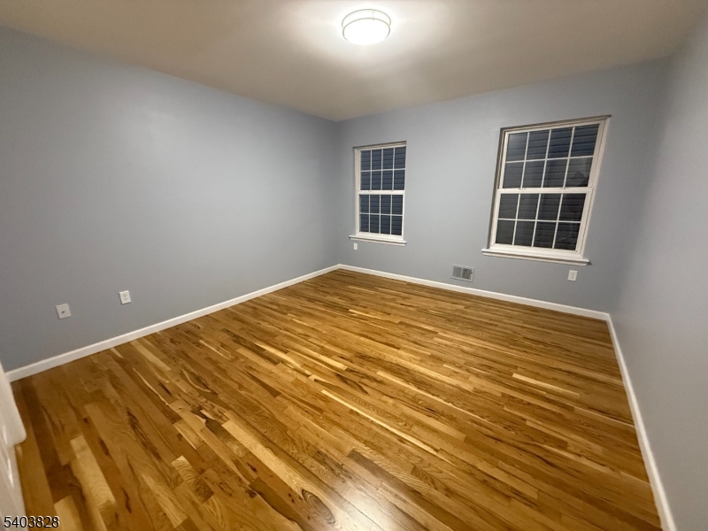 527 4th Avenue, Unit 1 Elizabeth, NJ 07202 - Photo 13 of 21 a view of empty room with windows