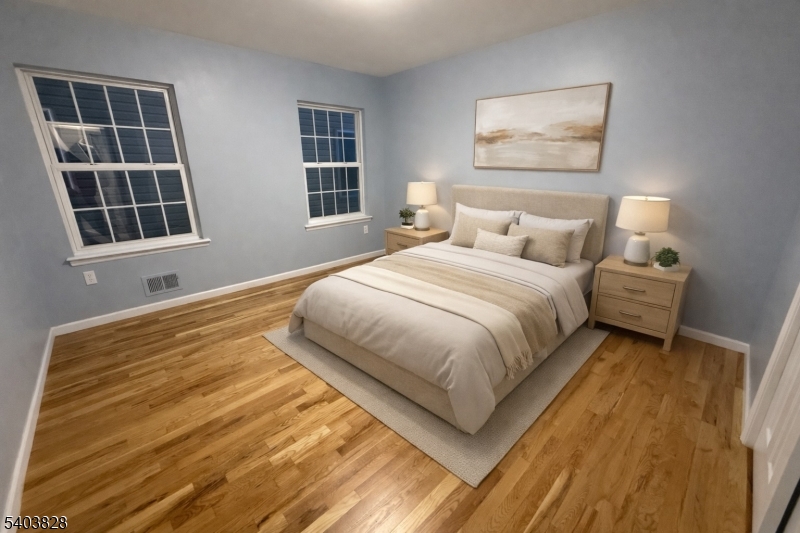 527 4th Avenue, Unit 1 Elizabeth, NJ 07202 - Photo 15 of 21 a bedroom with bed and a window