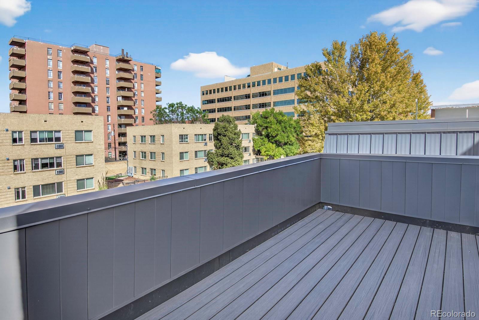832 North Cherry Street, Unit 1 Denver, CO 80220 - Photo 25 of 41 a view of balcony with balcony and wooden floor