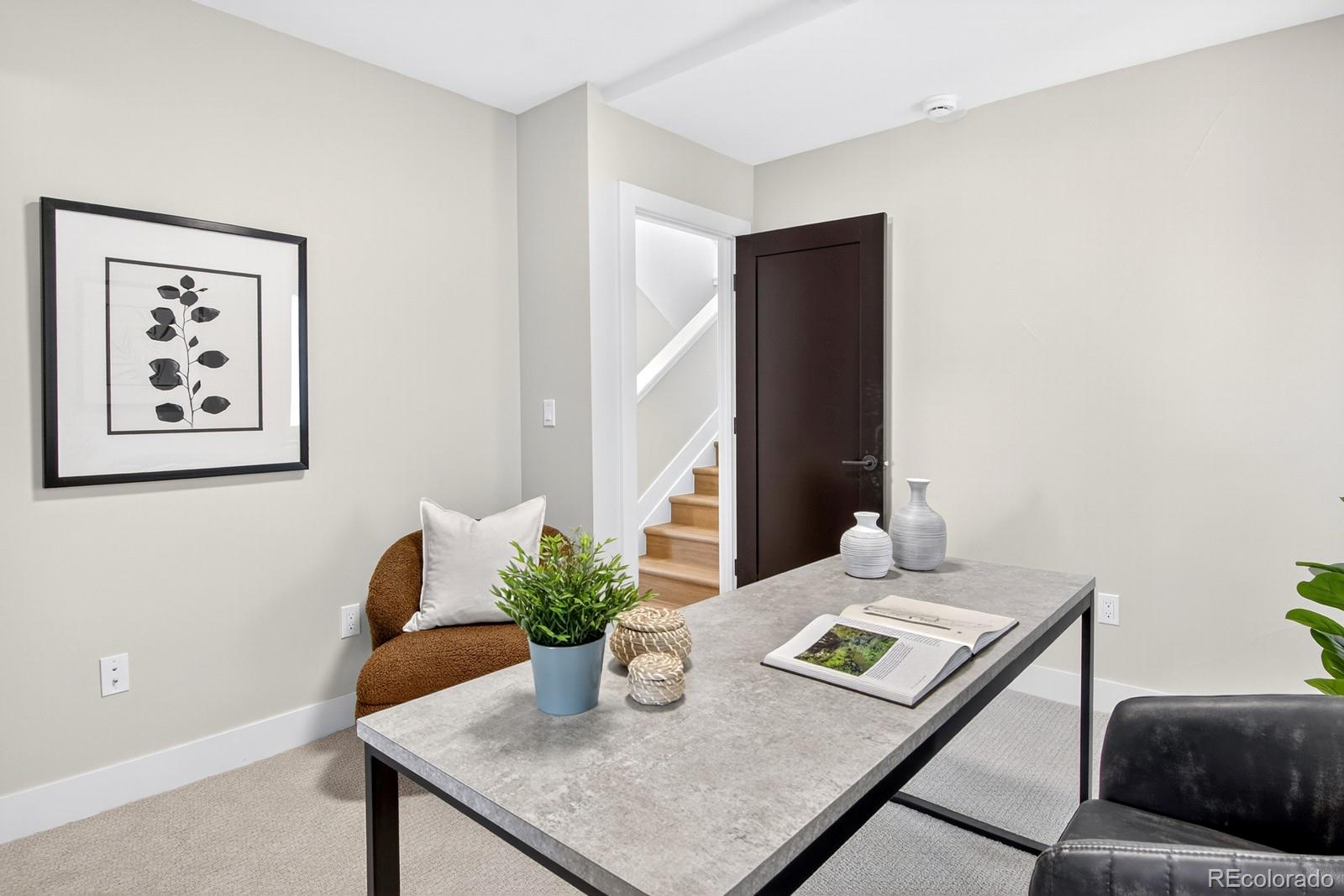 832 North Cherry Street, Unit 1 Denver, CO 80220 - Photo 30 of 41 a view of a dining room with furniture and wooden floor