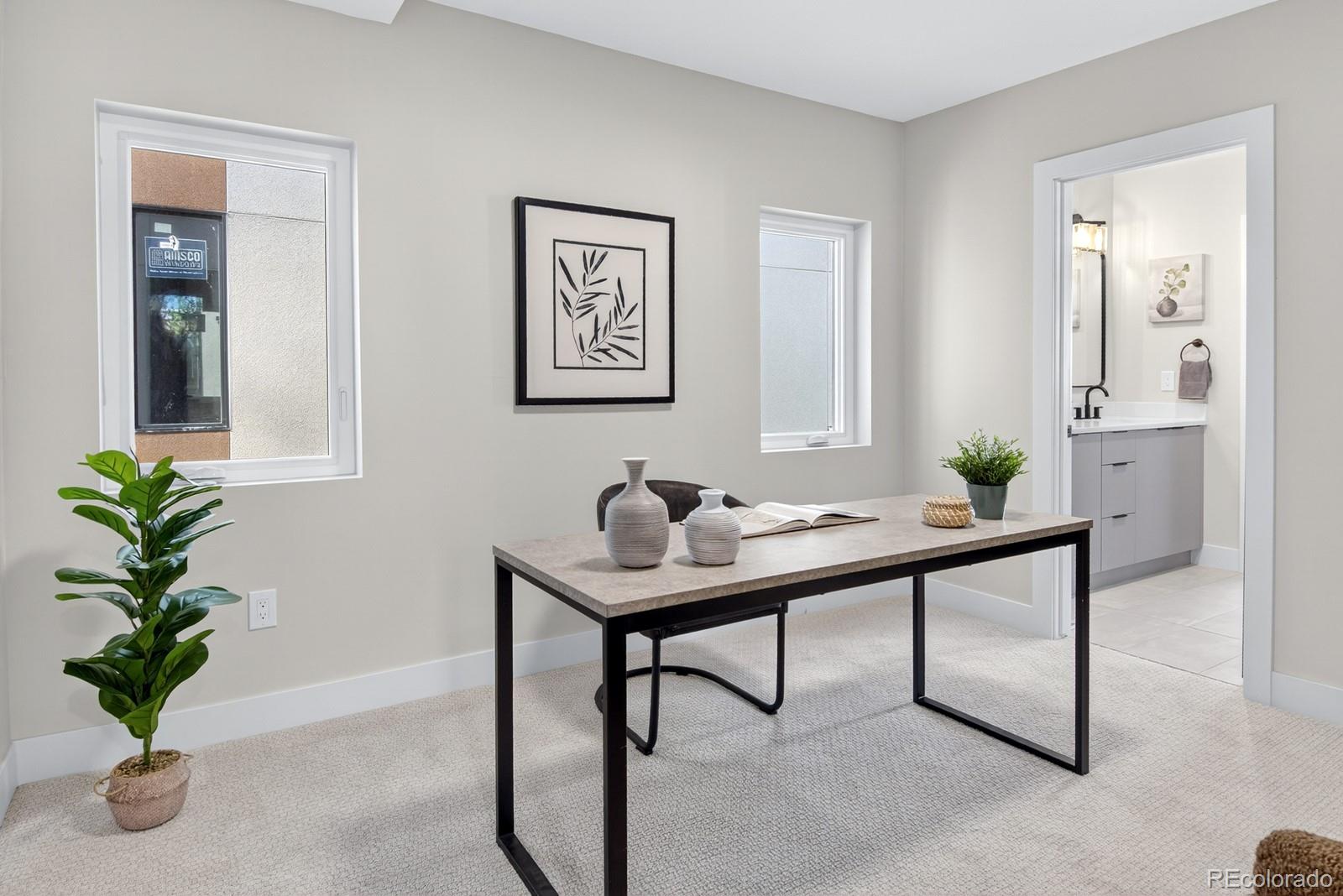 832 North Cherry Street, Unit 1 Denver, CO 80220 - Photo 31 of 41 a view of a room with a table and chair