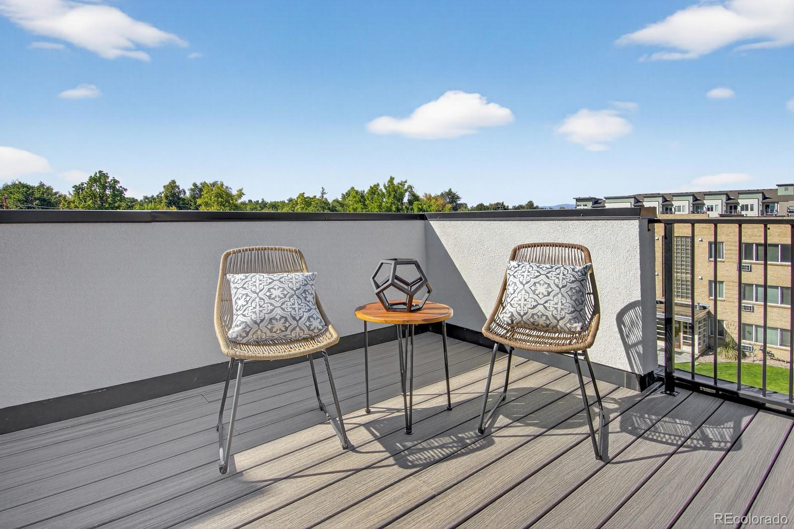 832 North Cherry Street, Unit 1 Denver, CO 80220 - Photo 33 of 41 a view of sitting area on wooden floor