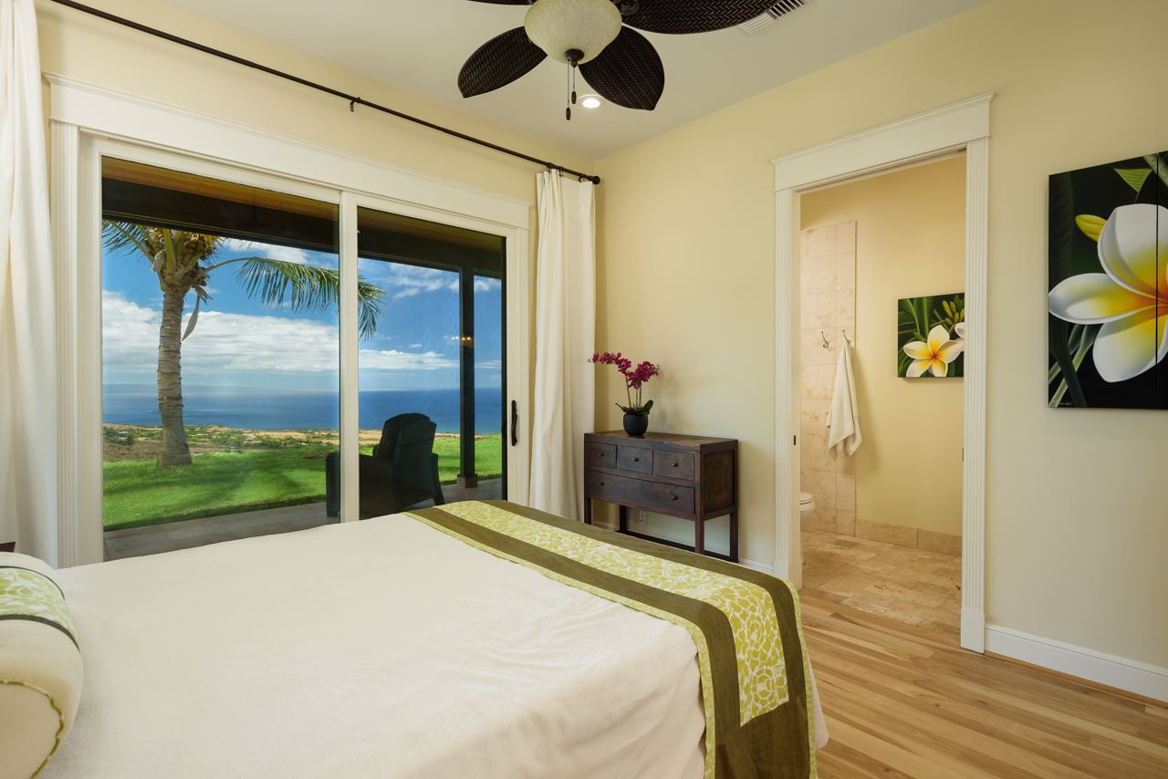 554 Punakea Loop Lahaina, HI 96761 - Photo 16 of 30 a bedroom with a bed and a large window