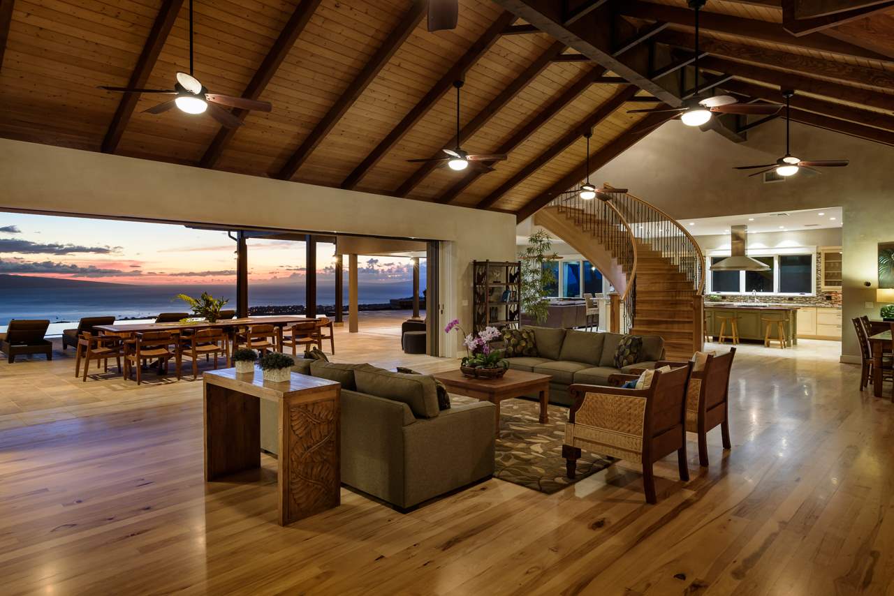 554 Punakea Loop Lahaina, HI 96761 - Photo 25 of 30 a living room with lots of furniture and hard wood flooring