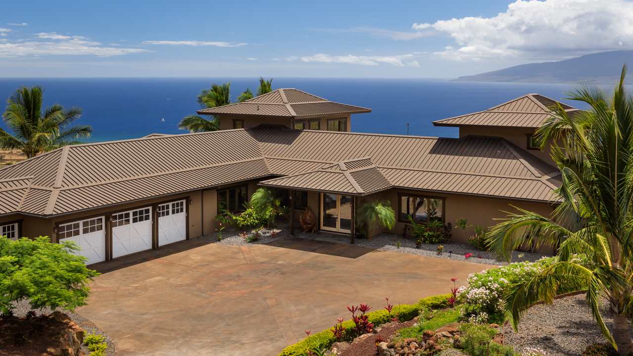 554 Punakea Loop Lahaina, HI 96761 - Photo 5 of 30 a front view of house with yard outdoor seating and barbeque oven