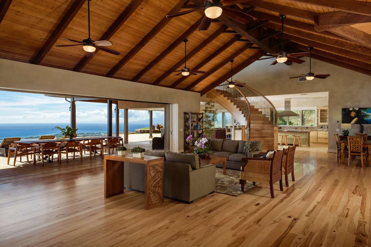 554 Punakea Loop Lahaina, HI 96761 - Photo 6 of 30 a living room with furniture large windows and wooden floor