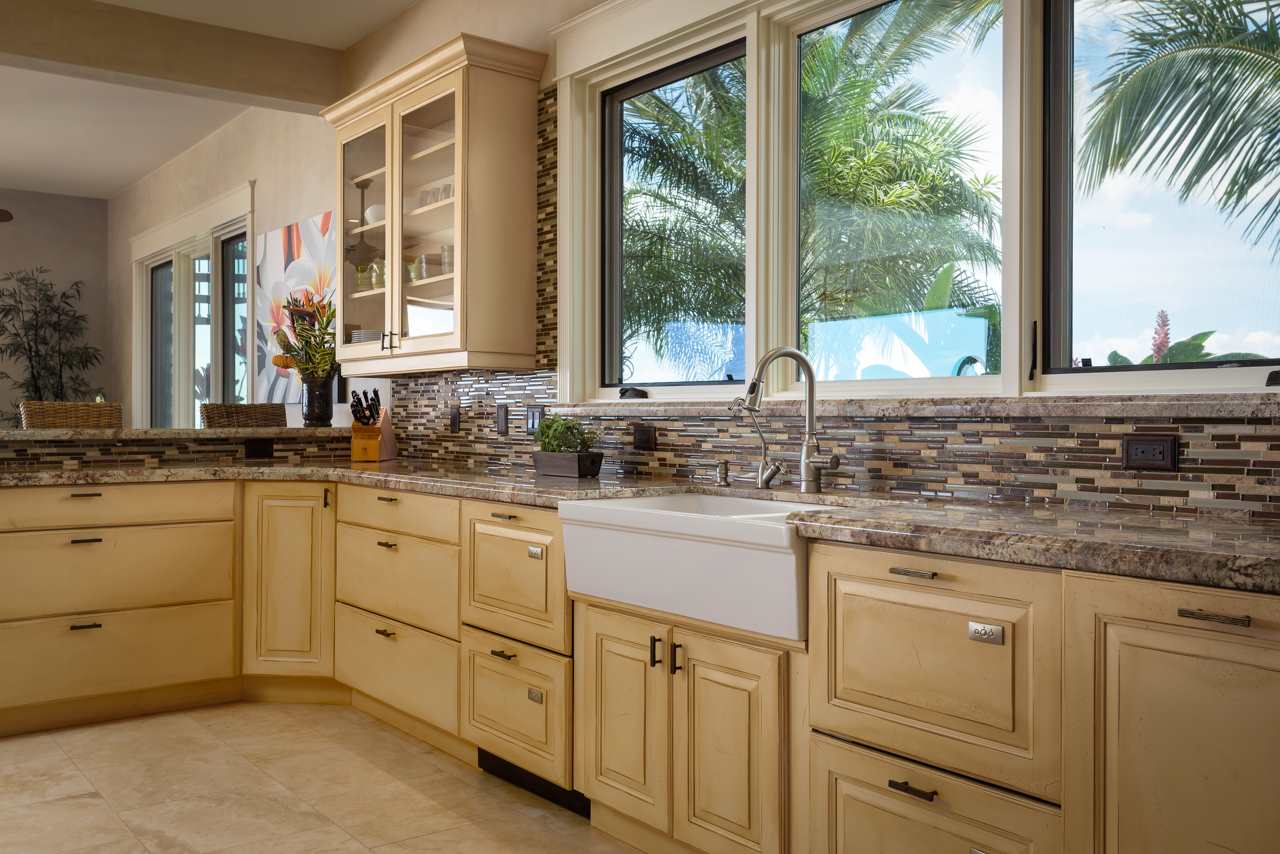 554 Punakea Loop Lahaina, HI 96761 - Photo 9 of 30 a kitchen with cabinets appliances and a large window