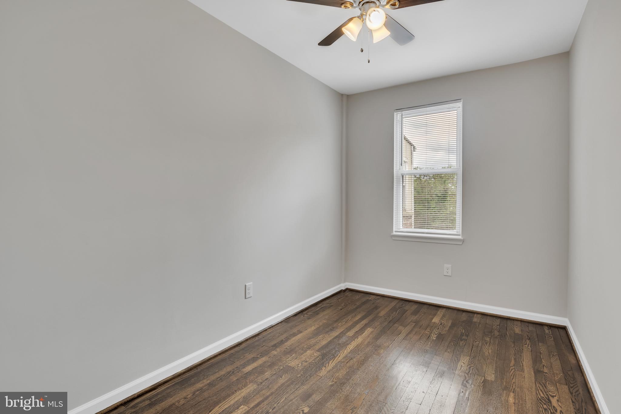 4437 Old York Road Baltimore, MD 21212 - Photo 8 of 15 an empty room with a window