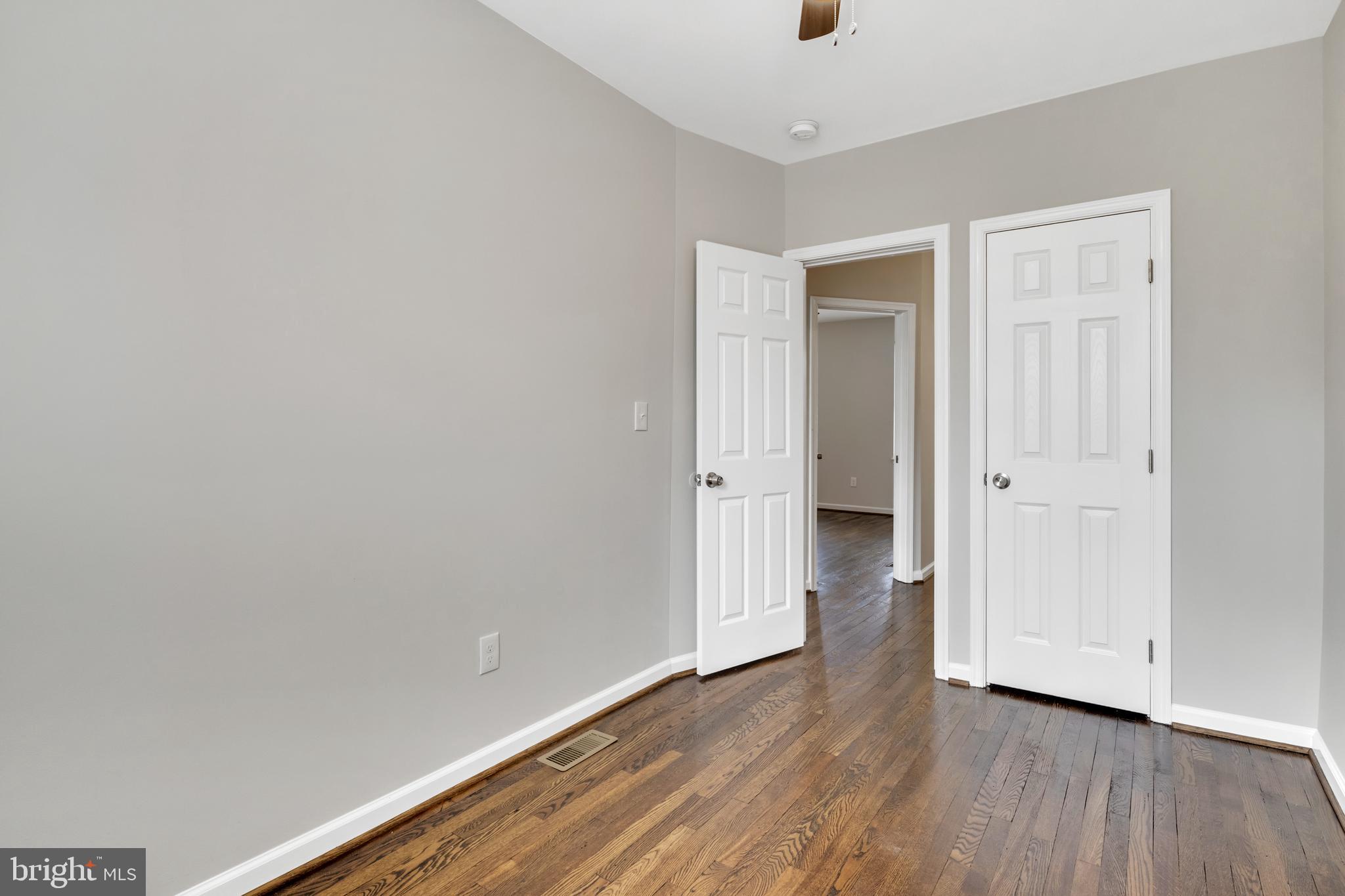 4437 Old York Road Baltimore, MD 21212 - Photo 9 of 15 a view of hallway with wooden floor