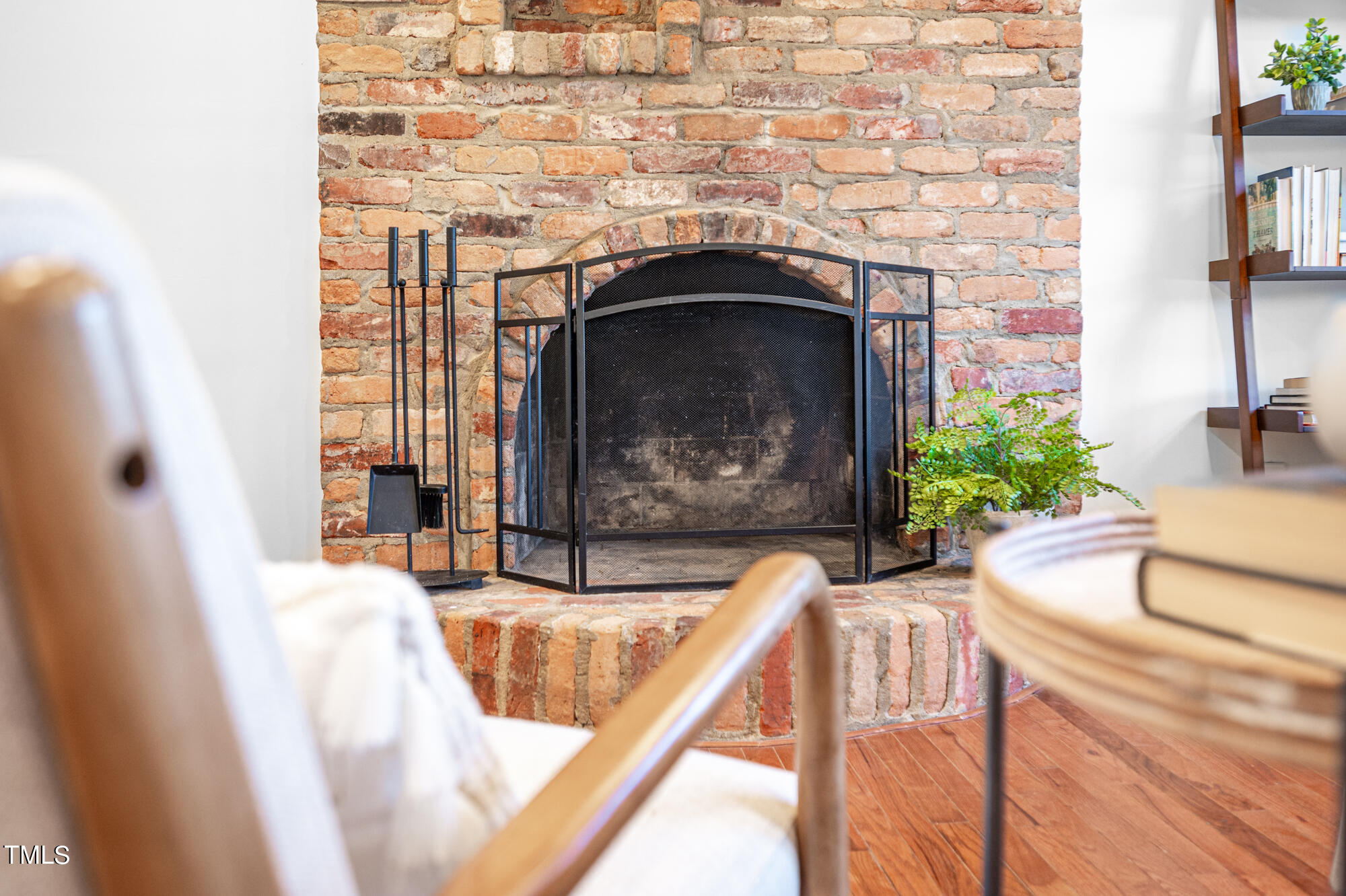 5215 Pelham Road Durham, NC 27713 - Photo 21 of 45 a living room with furniture and a fireplace