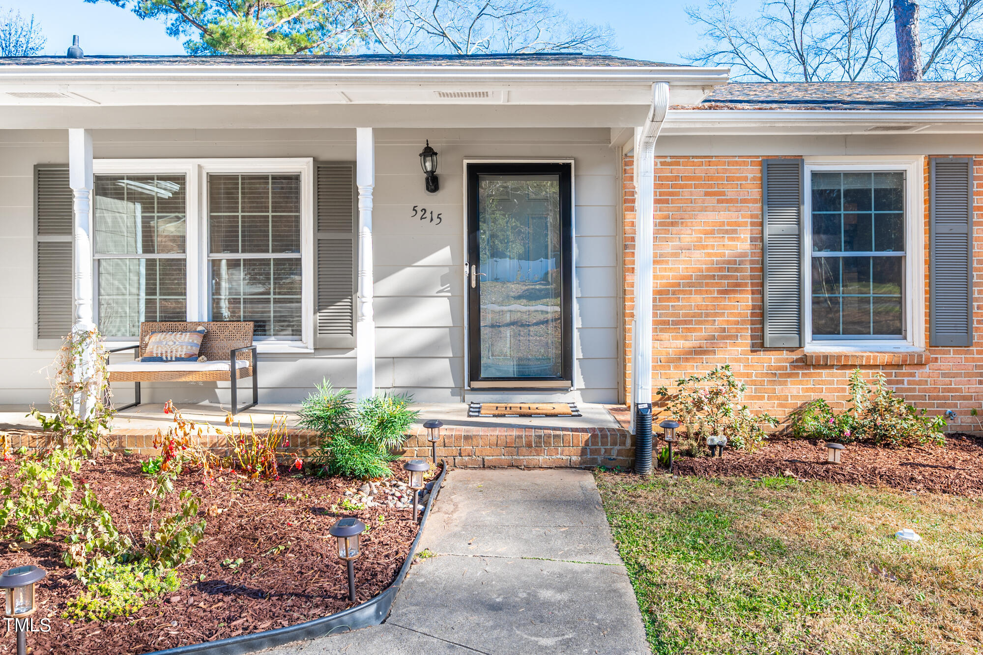 5215 Pelham Road Durham, NC 27713 - Photo 3 of 45 a front view of a house with a yard