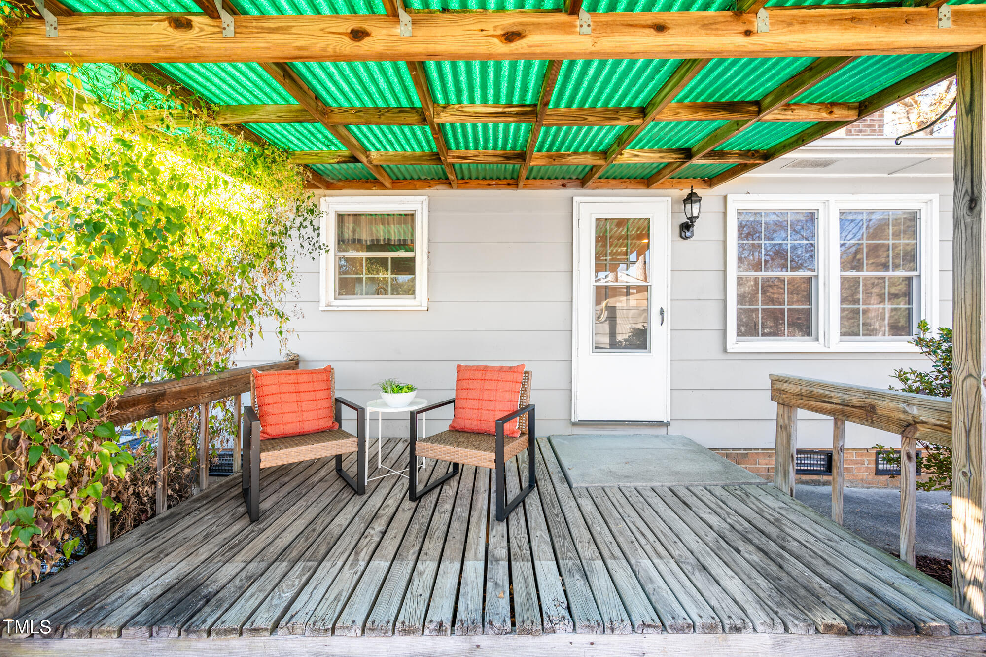5215 Pelham Road Durham, NC 27713 - Photo 35 of 45 a view of a house with a patio and wooden flooring