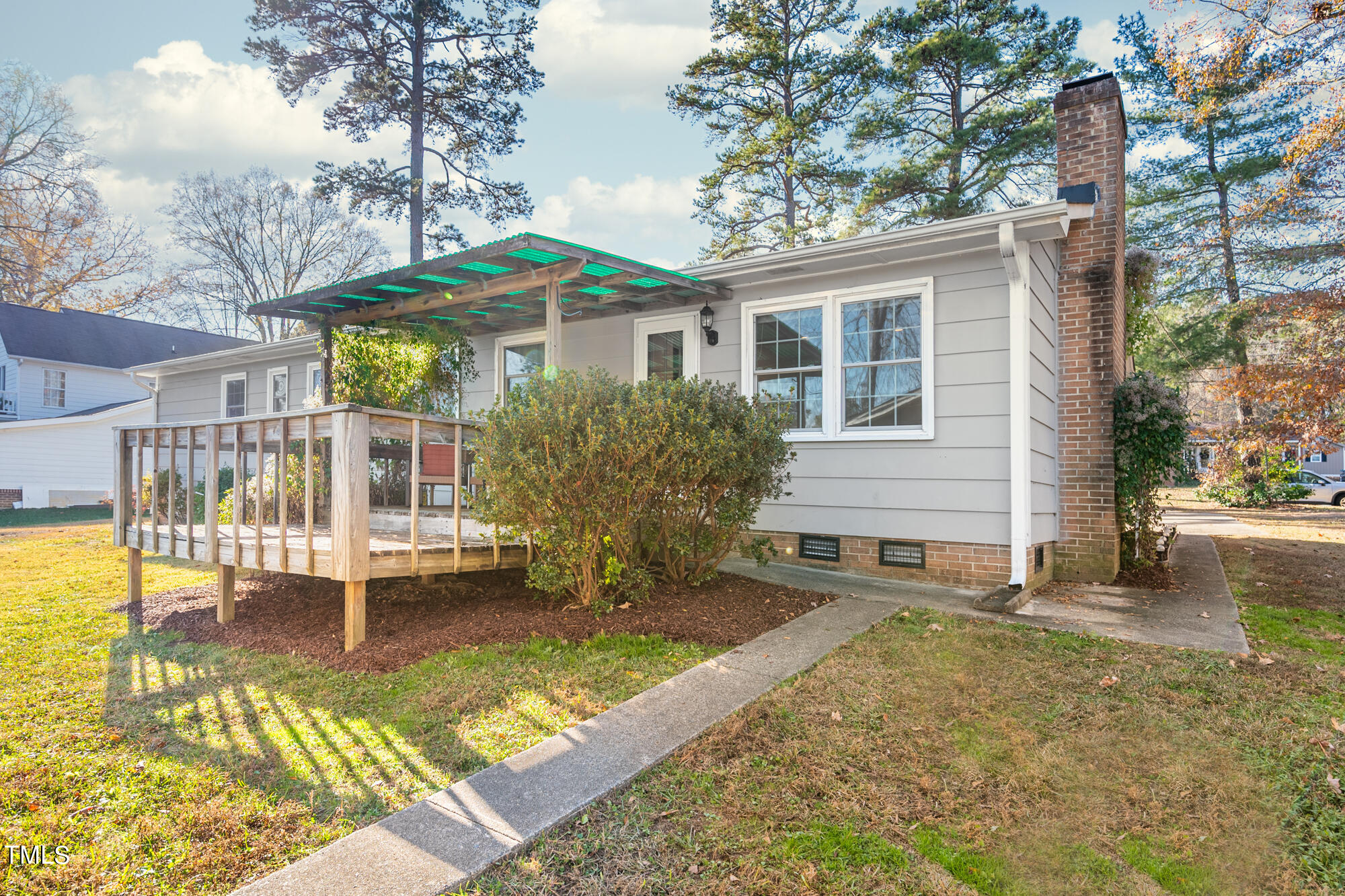 5215 Pelham Road Durham, NC 27713 - Photo 37 of 45 a view of a house with backyard and sitting area