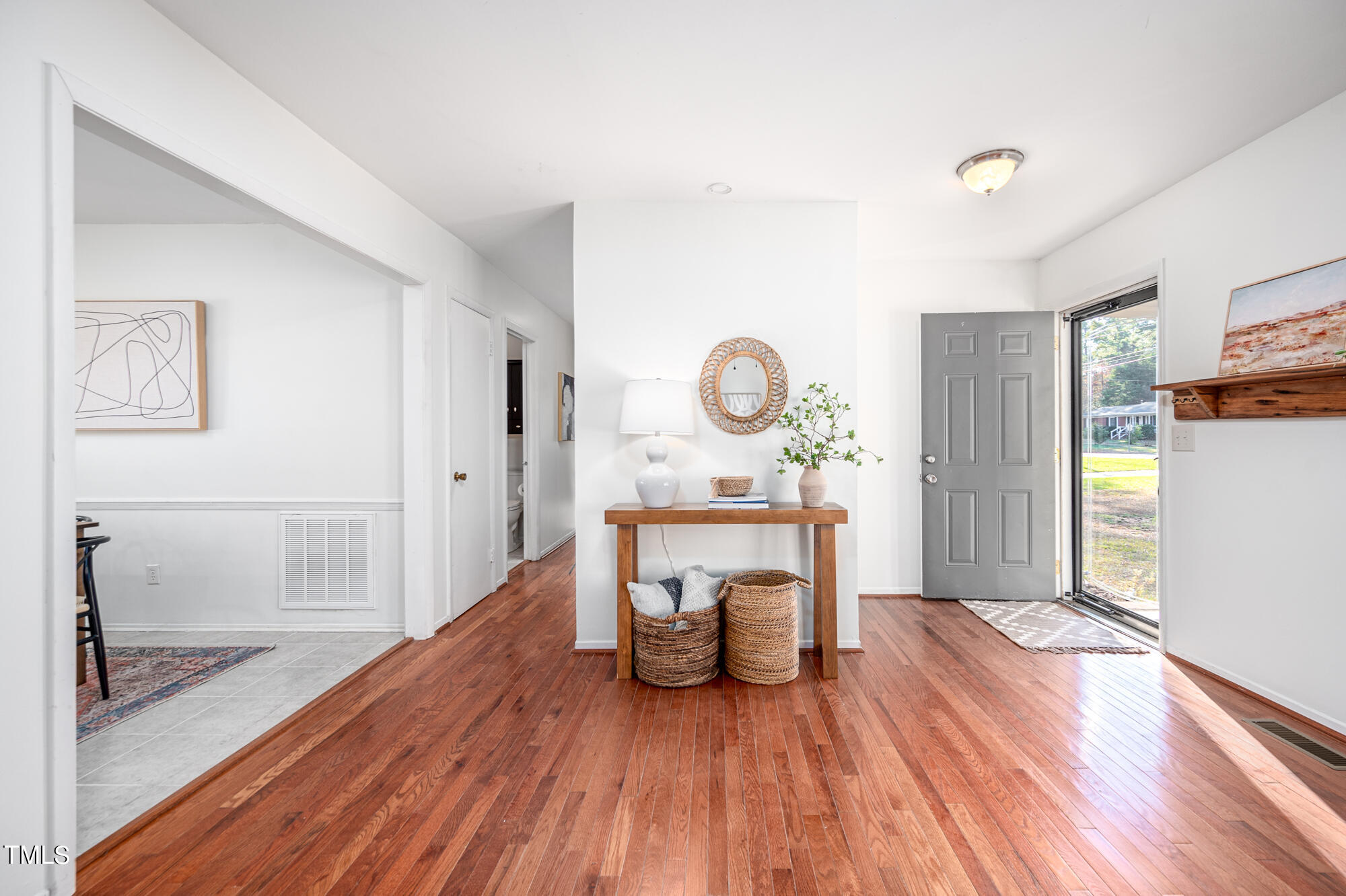 5215 Pelham Road Durham, NC 27713 - Photo 9 of 45 a living room with furniture and a wooden floor