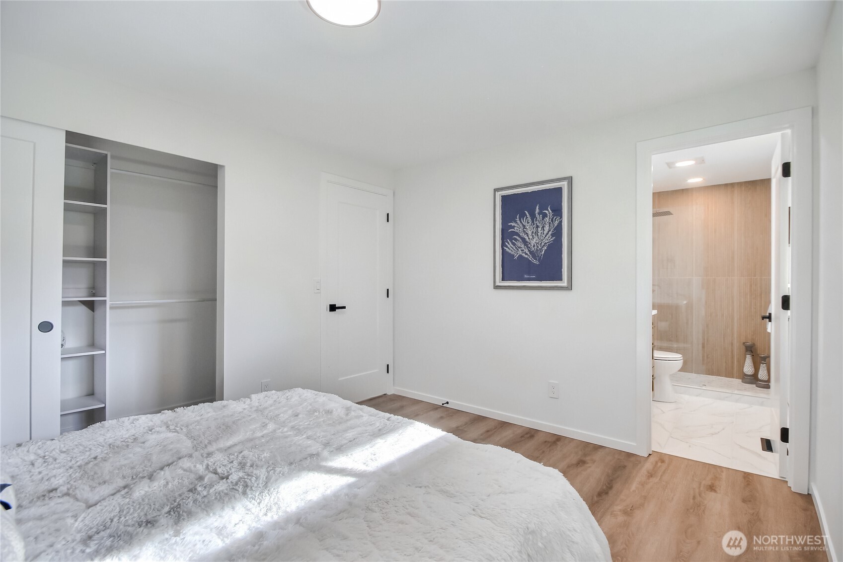 1229 Southwest 158th Street Burien, WA 98166 - Photo 16 of 40 a bedroom with a bed and view of bathroom