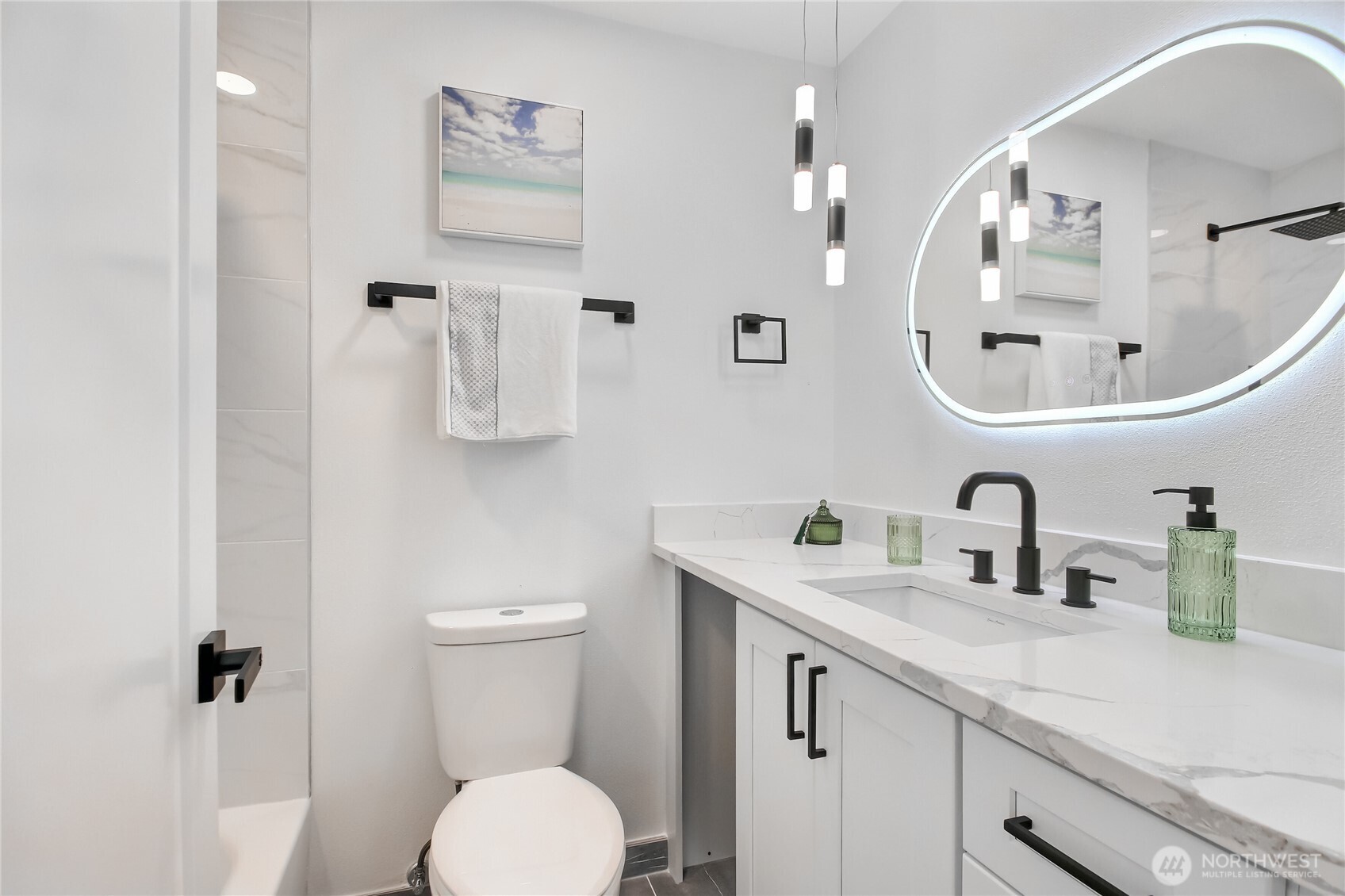 1229 Southwest 158th Street Burien, WA 98166 - Photo 22 of 40 a bathroom with a toilet sink and mirror