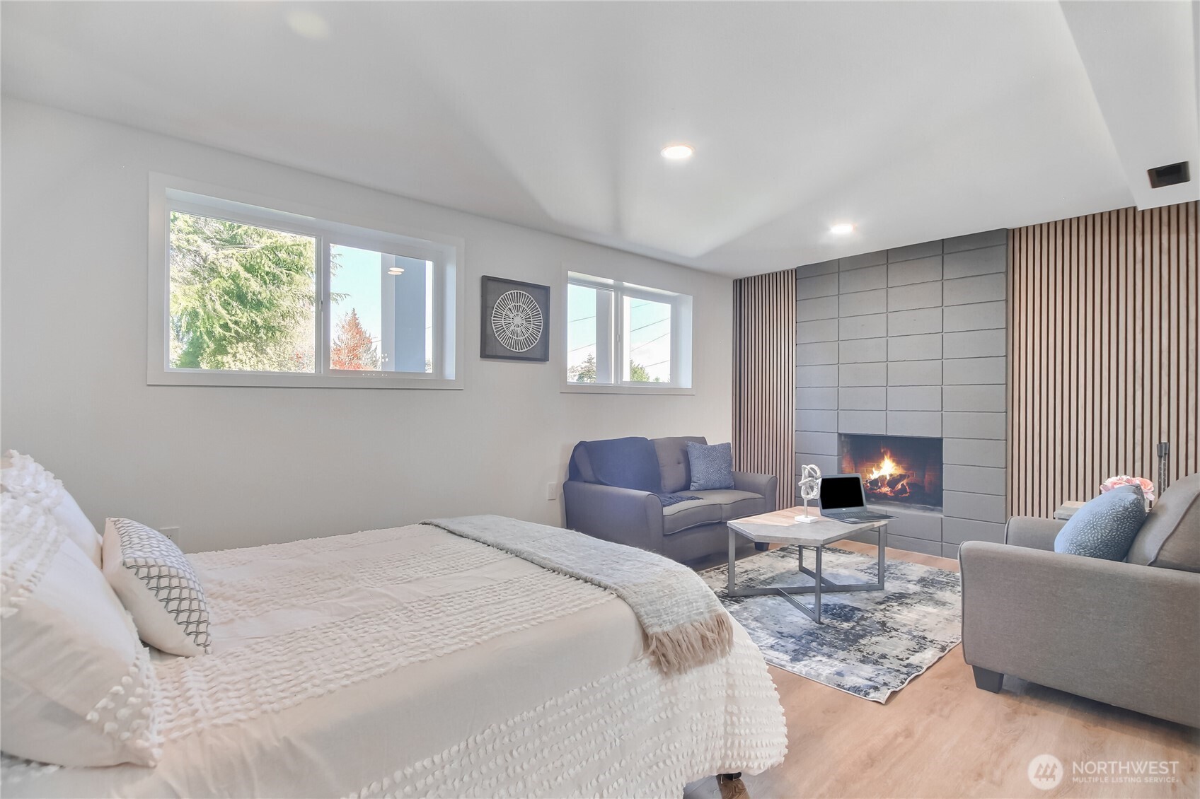 1229 Southwest 158th Street Burien, WA 98166 - Photo 25 of 40 a bedroom with furniture and a fireplace