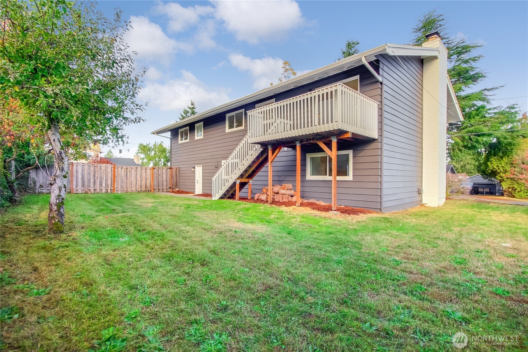 1229 Southwest 158th Street Burien, WA 98166 - Photo 31 of 40 a view of a house with a yard