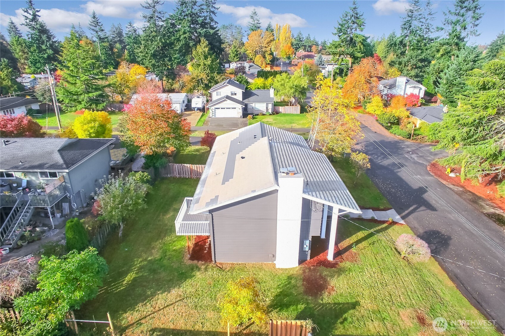 1229 Southwest 158th Street Burien, WA 98166 - Photo 34 of 40 an aerial view of a house with a yard and trees