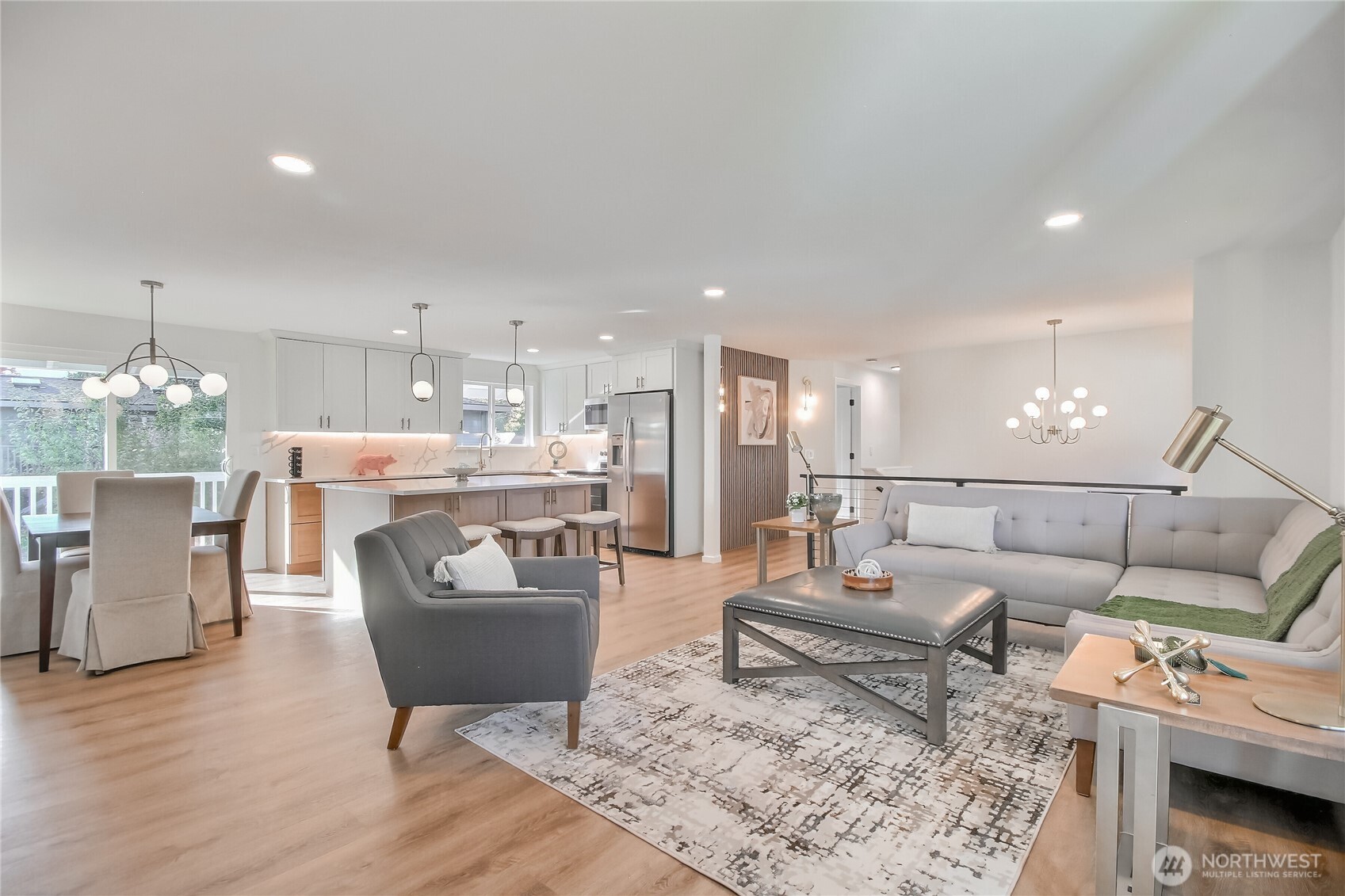 1229 Southwest 158th Street Burien, WA 98166 - Photo 8 of 40 a living room with furniture and a chandelier