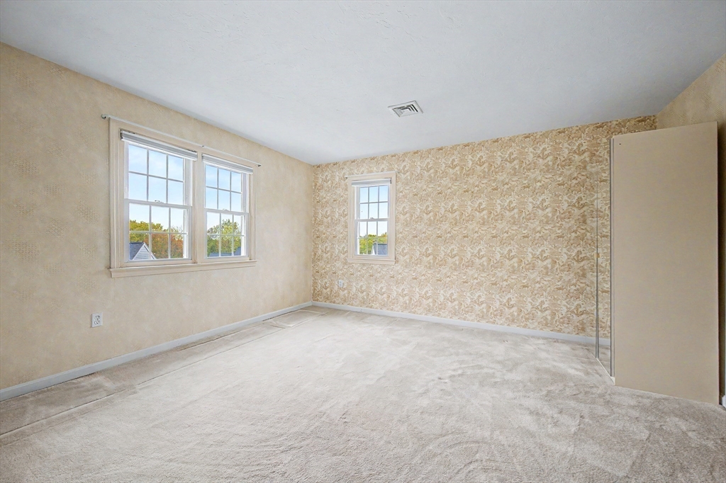 3 Oak View Terrace, Unit 3 Franklin, MA 02038 - Photo 21 of 38 a view of an empty room with a window