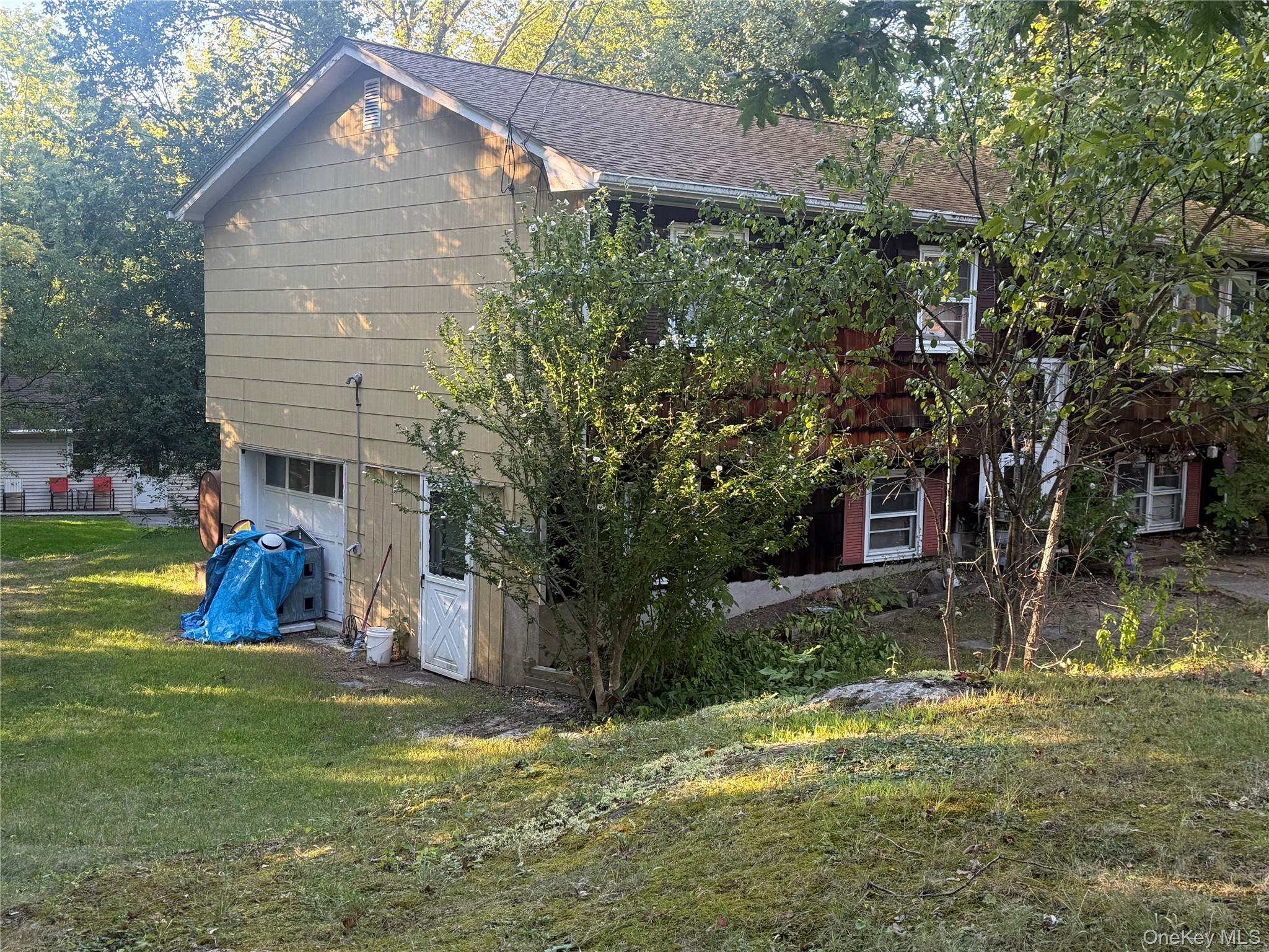 20 McGill Road Monroe, NY 10950 - Photo 3 of 11 a view of a house with a yard