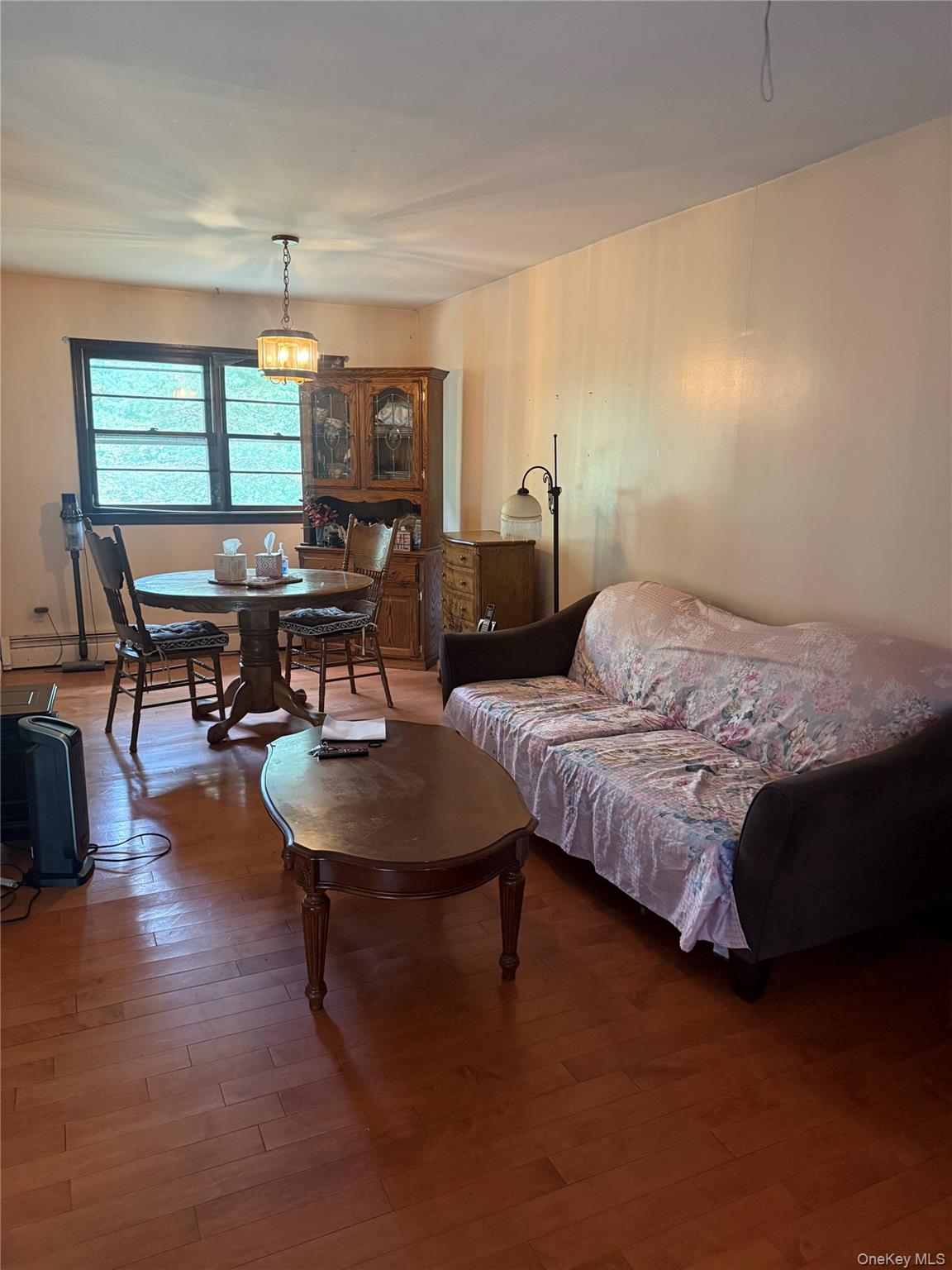 20 McGill Road Monroe, NY 10950 - Photo 6 of 11 a living room with furniture and a wooden floor